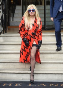 51917487 Singer Lady Gaga leaves the Langham Hotel in London, England on November 25, 2015. The 'Poker Face' singer showed off her eccentric fashion sense in a knee-length orange coat with a zig-zag pattern, sheer black stockings, platform black shoes and black leather gloves. FameFlynet, Inc - Beverly Hills, CA, USA - +1 (818) 307-4813 RESTRICTIONS APPLY: USA/CHINA ONLY